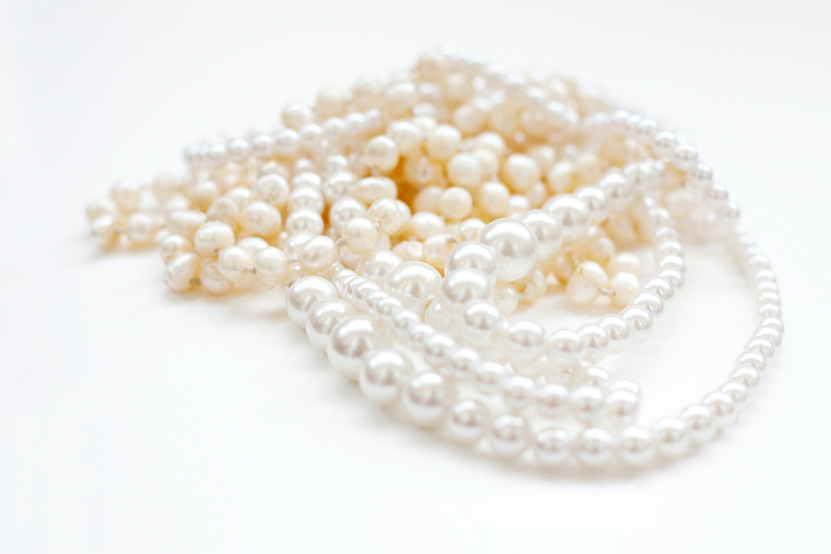 June birthstone strings of white pearls