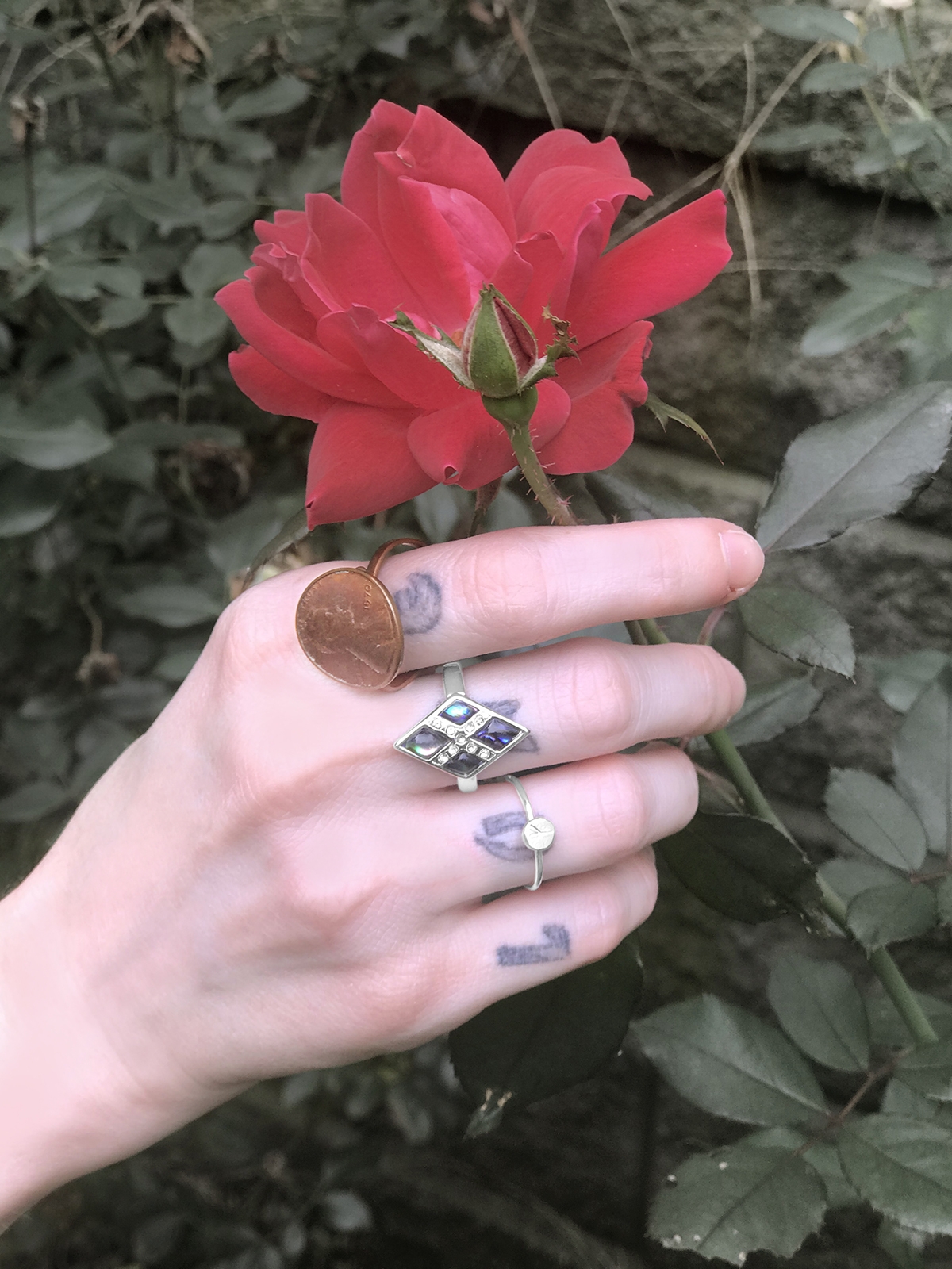 living jewelry sasha picking flower