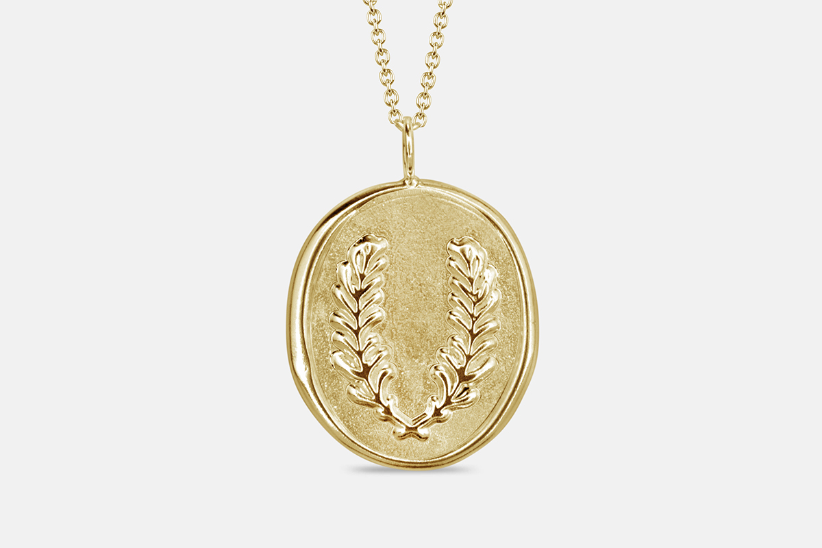 14k gold aromatherapy necklace featuring rosemary for memory and clarity
