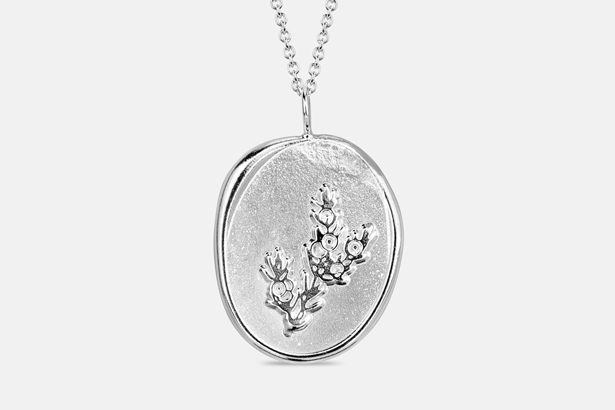 Sterling silver aromatherapy necklace with Juniper for protection and positivity.