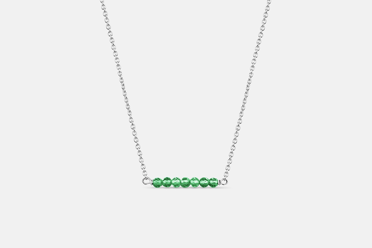 Emerald gemstone tiny birthstone necklace in sterling silver.