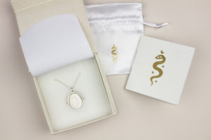 Spinner necklace oracle system packaging