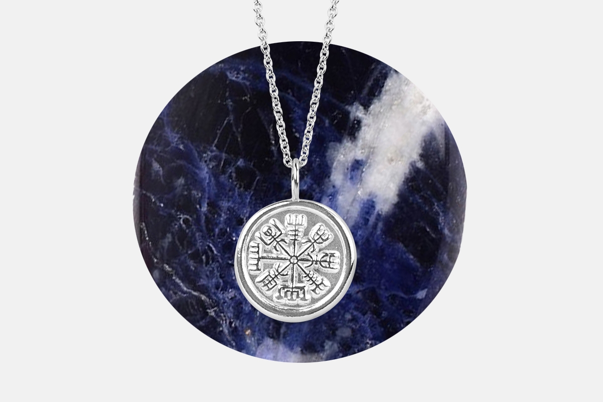 Sterling silver vegvisir necklace with a large round sodalite palm stone.