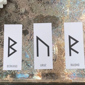Rune divination reading for November 15 shows three cards: Berkano, Uruz, and Raidho