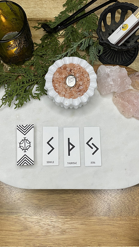 Rune divination reading for November 29th shows three cards Sowilo, Thurisaz, and Jera