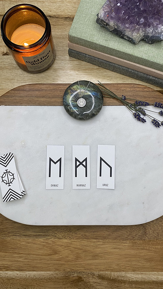Rune reading for December 6th 2021 showing three cards Ehwaz, Mannaz, and Uruz