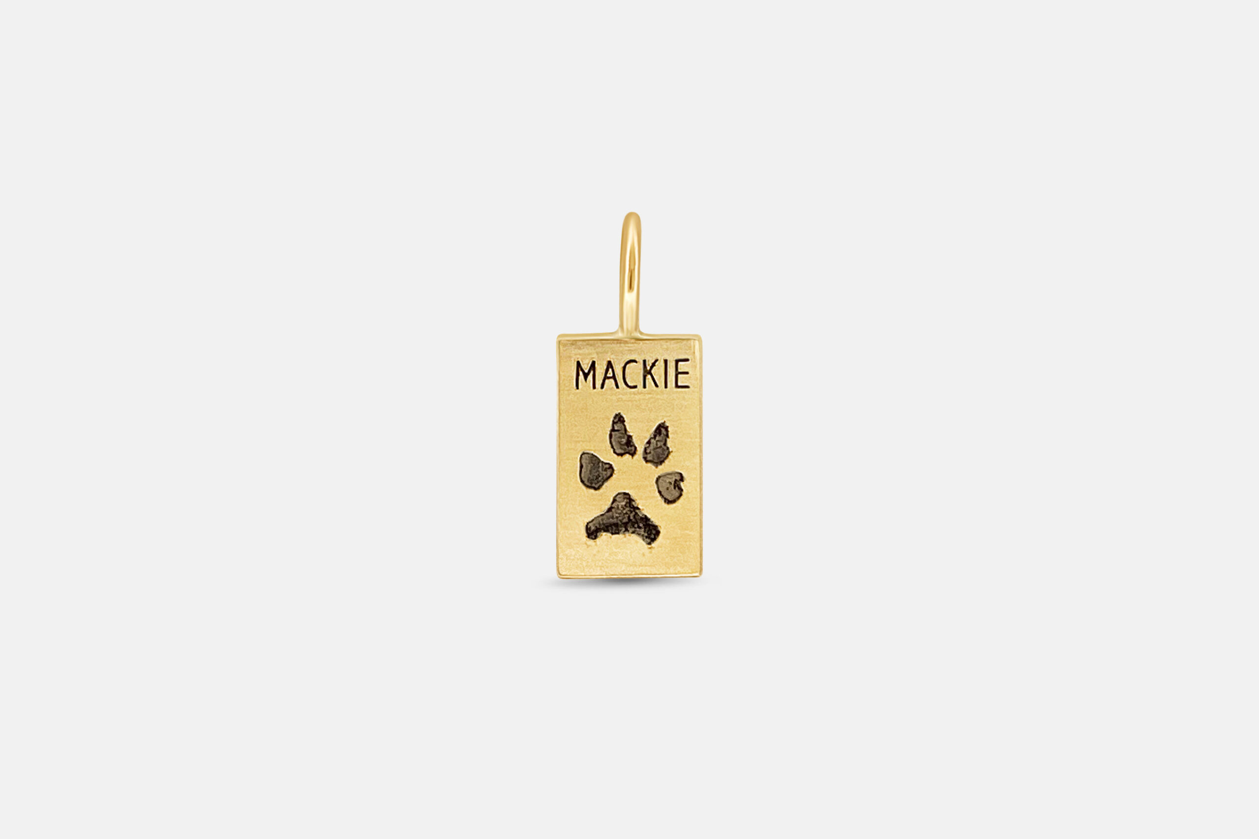 rectangular gold paw print pendant with personalized engraving