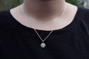 Silver rune necklace algiz for luck.