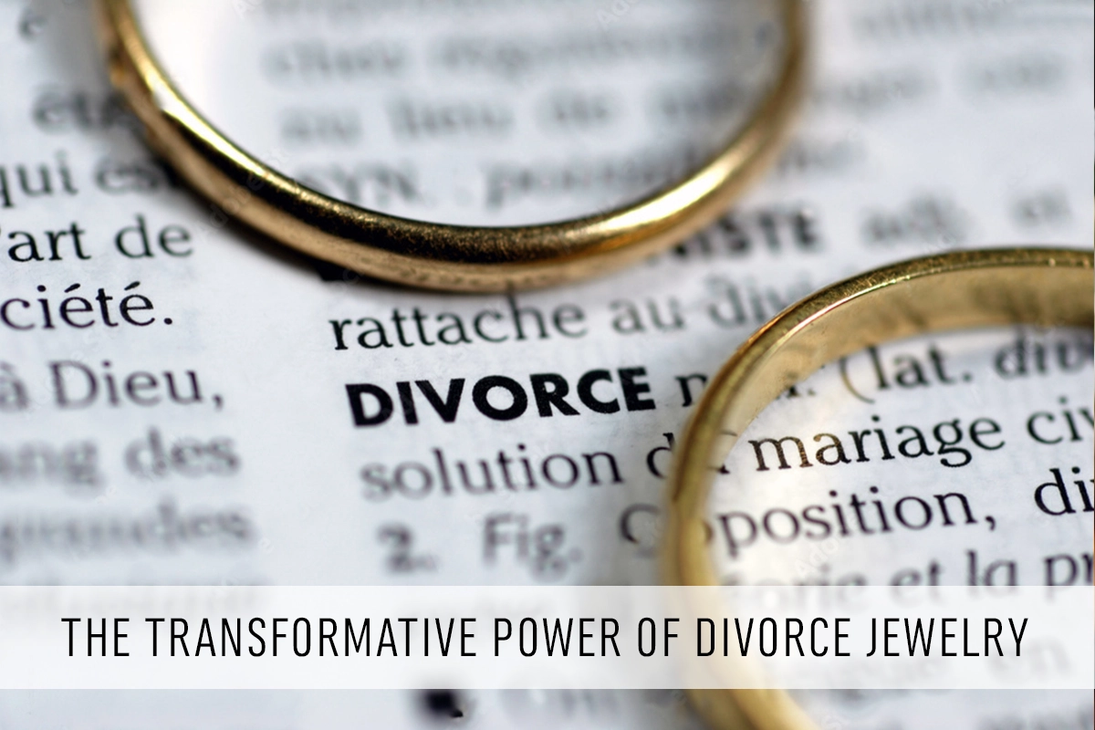 Photo of two wedding bands on a dictionary showing the definition of divorce.