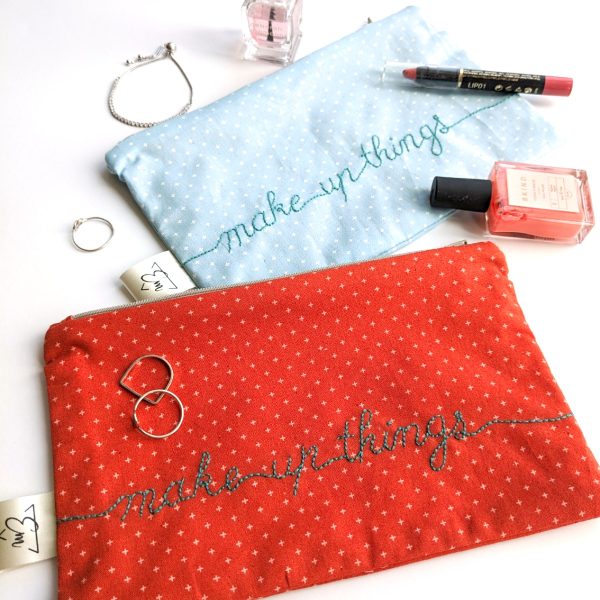 Embroidered zippered pouch